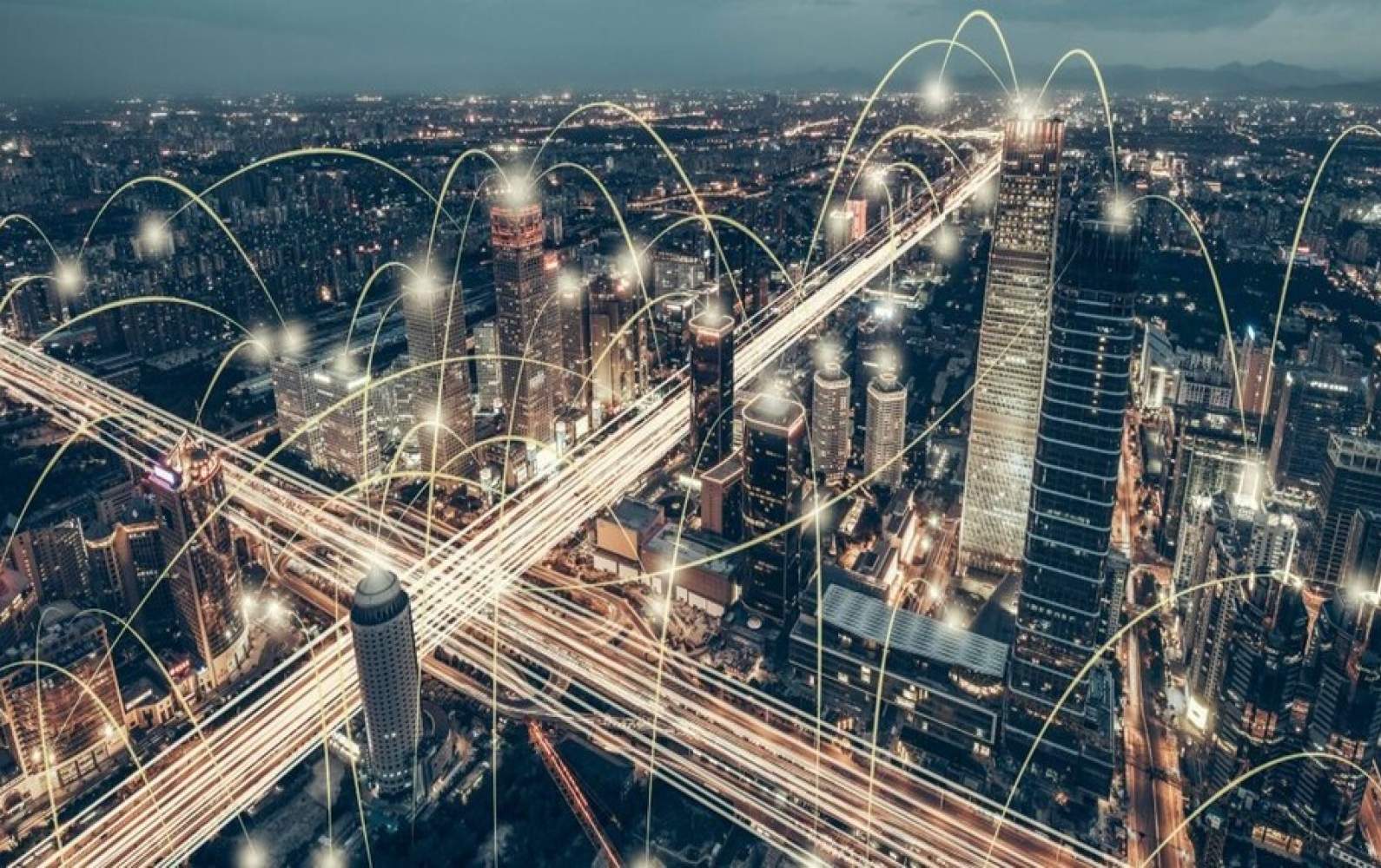 Data network linking a city at night, illustrating growth structured by an ERP